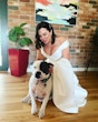 Bride wearing Darius wedding dress by Maggie Sottero with her dog