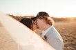 Bride In Tulle A-Line Wedding Dress Called Lorraine Lane Marie By Rebecca Ingram With Groom