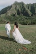 Bride wearing Winter wedding dress by Maggie Sottero follows her husband