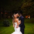 Bride wearing Holden wedding dress by Sottero and Midgley being kissed by her husband