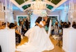 Bride wearing Zinaida by Maggie Sottero kissing her husband at their ceremony