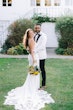 Bride In Lace Crepe Wedding Dress Called Baxley By Rebecca Ingram With Groom