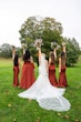 Bride wearing Wendi wedding dress by Rebecca Ingram with her bridesmaids