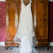 Real Bride's A-Line Wedding Gown with Lace Motifs Over Tulle and Beaded Lace Bodice Embellished with Swarovski Crystals Called Priscilla by Rebecca Ingram