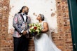 Bride Wearing Chic Crepe Wedding Gown Called Anson By Sottero And Midgley With Groom Wearing Colorful Tuxedo