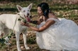 Bride Wearing Lace Ballgown Wedding Dress Called Sasha By Maggie Sottero Petting Her Dog