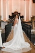 Bride wearing Hamilton wedding dress by Sottero and Midgley inside a church