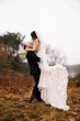 Bride In Lace Beaded Mermaid Wedding Dress Called January By Maggie Sottero With Groom