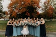 Bride wearing Pia wedding dress by Maggie Sottero with bridesmaids