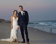 Groom with Bride at Beach Wedding wearing Sexy Boho Wedding Dress called Tuscany by Maggie Sottero.