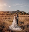 Real Bride wearing rustic boho lace wedding dress called Kendall by Maggie Sottero.