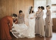 Bride Wearing Lacey Sheath Long Sleeve Wedding Dress Called Francesca By Maggie Sottero With Bridesmaids Dress Train