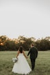 Bride Wearing Sparkly Ballgown Wedding Dress Called Zartasha By Sottero and Midgley With Groom