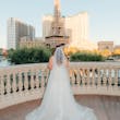 Bride at a Las Vegas Wedding Wearing Lace Ballgown Called Ellen by Rebecca Ingram