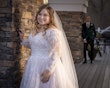 Bride wearing Seneca wedding dress by Sottero and Midgley