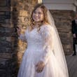 Bride wearing Seneca wedding dress by Sottero and Midgley