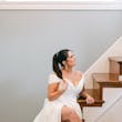 Bride wearing Ekaterina by Maggie Sottero sitting on the stairs