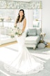 bride in lace crepe sheath wedding dress