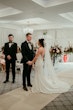 Groom With Bride Wearing Crepe Fit-And-Flare Wedding Dress Juanita Louise By Maggie Sottero