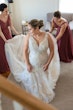 Curvy real bride wearing lace mermaid wedding dress called Judson by Maggie Sottero.
