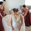 Curvy real bride wearing lace mermaid wedding dress called Judson by Maggie Sottero.