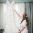 Bride Showing Off Wedding Dress Called Delilah By Maggie Sottero While Getting Ready
