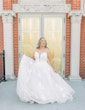 Bride wearing Hattie Lane Marie wedding dress by Rebecca Ingram