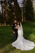 Bride wearing Hilo by Maggie Sottero with her husband