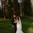 Bride wearing Hilo by Maggie Sottero with her husband