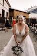 Bride Wearing Ball Gown With Shimmery Lace Motifs Valona By Sottero And Midgley