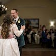 Bride wearing Seneca wedding dress by Sottero and Midgley dancing with her husband