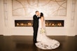 Bride In Lace Beaded Mermaid Wedding Dress Called January By Maggie Sottero With Groom