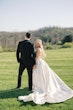 Bride wearing Selena by Maggie Sottero with her husband