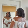 Bride wearing off the shoulder lace wedding dress