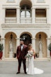 Groom and Bride Wearing Lace Mermaid Wedding Gown Called Montgomery By Sottero and Midgley