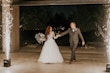 Groom And Bride Sparkler Exit. Bride Wearing Lace Ball Gown Called Mallory Dawn By Maggie Sottero