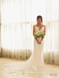 Bride with Bouquet wearing Sexy Boho Mermaid Wedding Dress called Tuscany by Maggie Sottero.