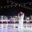 Bride wearing Johanna Lane by Maggie Sottero dancing with her husband