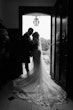 Bride wearing Saige by Maggie Sottero kissing her husband