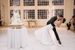 Bride wearing Barcelona by Sottero and Midgley being kissed by her husband