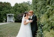 Bride Wearing Lace Princess Dress Called Harlem By Maggie Sottero Kissing Groom