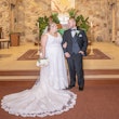 Bride wearing Lace A-line Wedding Dress called Trinity Lynette by Maggie Sottero with the groom