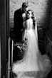 Groom with Bride in Dreamy Beaded Floral Lace A-Line Wedding Dress Called Laramie by Sottero & Midgley