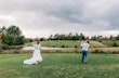 Groom and Bride Wearing Boho Wedding Dress Called Lorraine Dawn By Rebecca Ingram Playing Golf