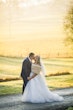 Groom With Bride Wearing Tulle Ballgown Talia By Maggie Sottero