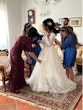 Bride Wearing Glam Long Sleeve Wedding Dress Called Seneca By Sottero And Midgley Getting Ready