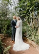 Bride wearing Bethany wedding dress by Rebecca Ingram kissing her husband