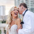 Groom Whispering In Brides Ear Wearing Lace Mermaid Wedding Dress Called Bronson