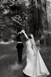 Bride wearing Hilo by Maggie Sottero dancing with her husband