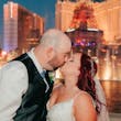 Groom and Bride at a Las Vegas Wedding Wearing Lace Ballgown Called Ellen by Rebecca Ingram